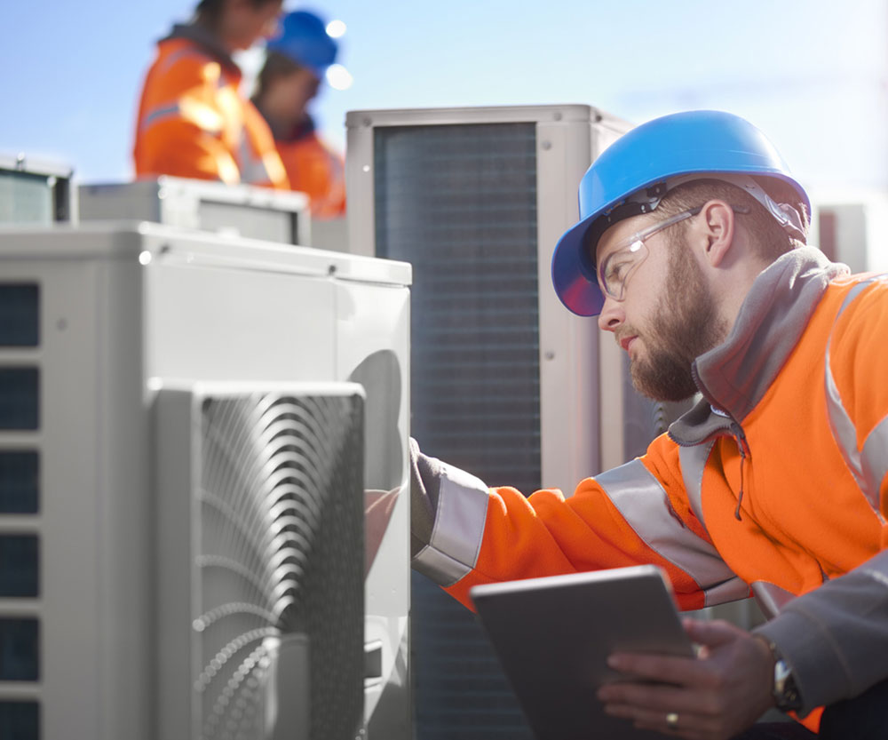 c-2 Close-up Of Building Exterior With Air Heat Pump