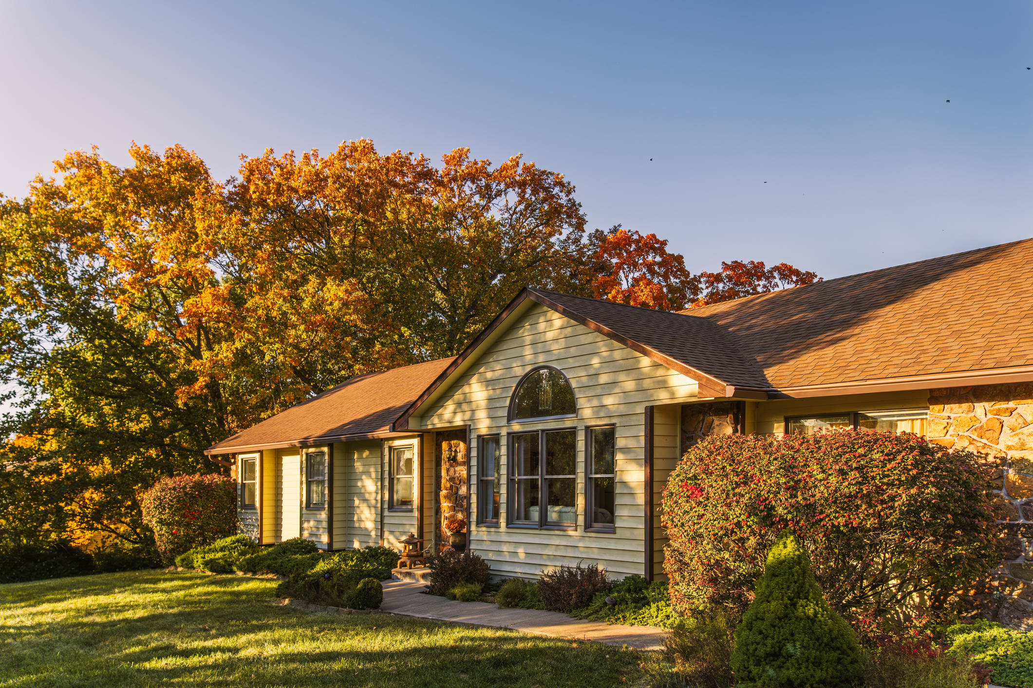 Midwestern suburban house in fall at sunset